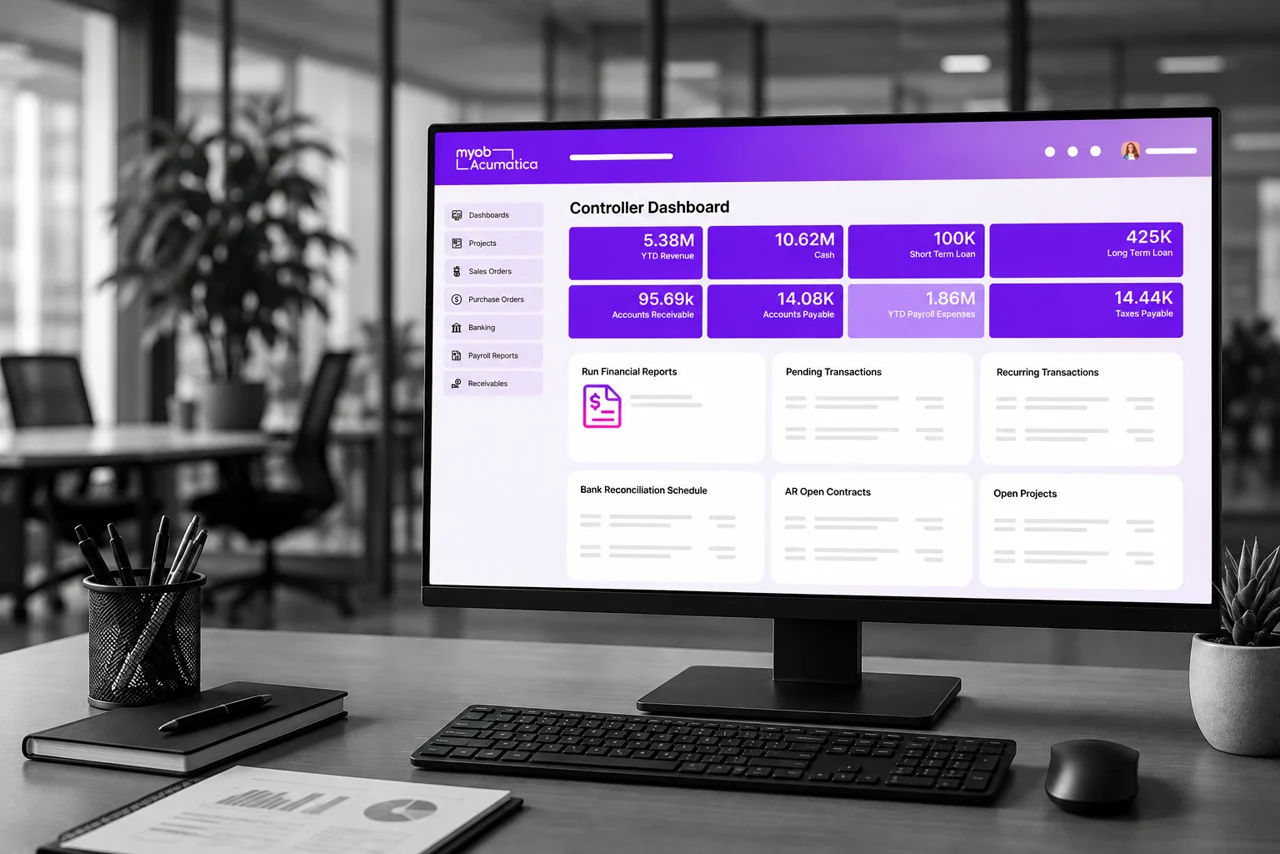 MYOB Acumatica controller dashboard on a desktop monitor showing YTD revenue, cash, receivables and payables